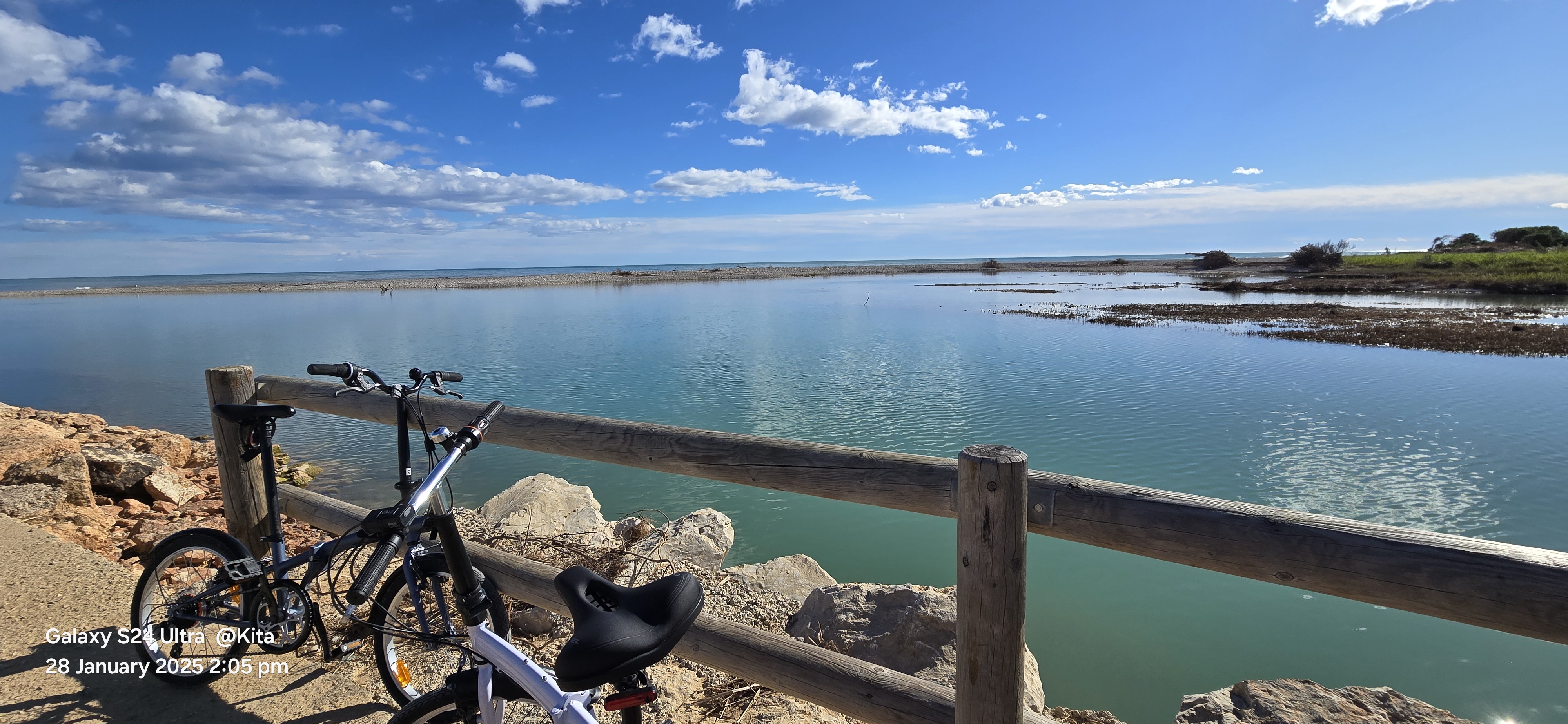 Bicycle overlooking the turquoise waters of CapiCorp