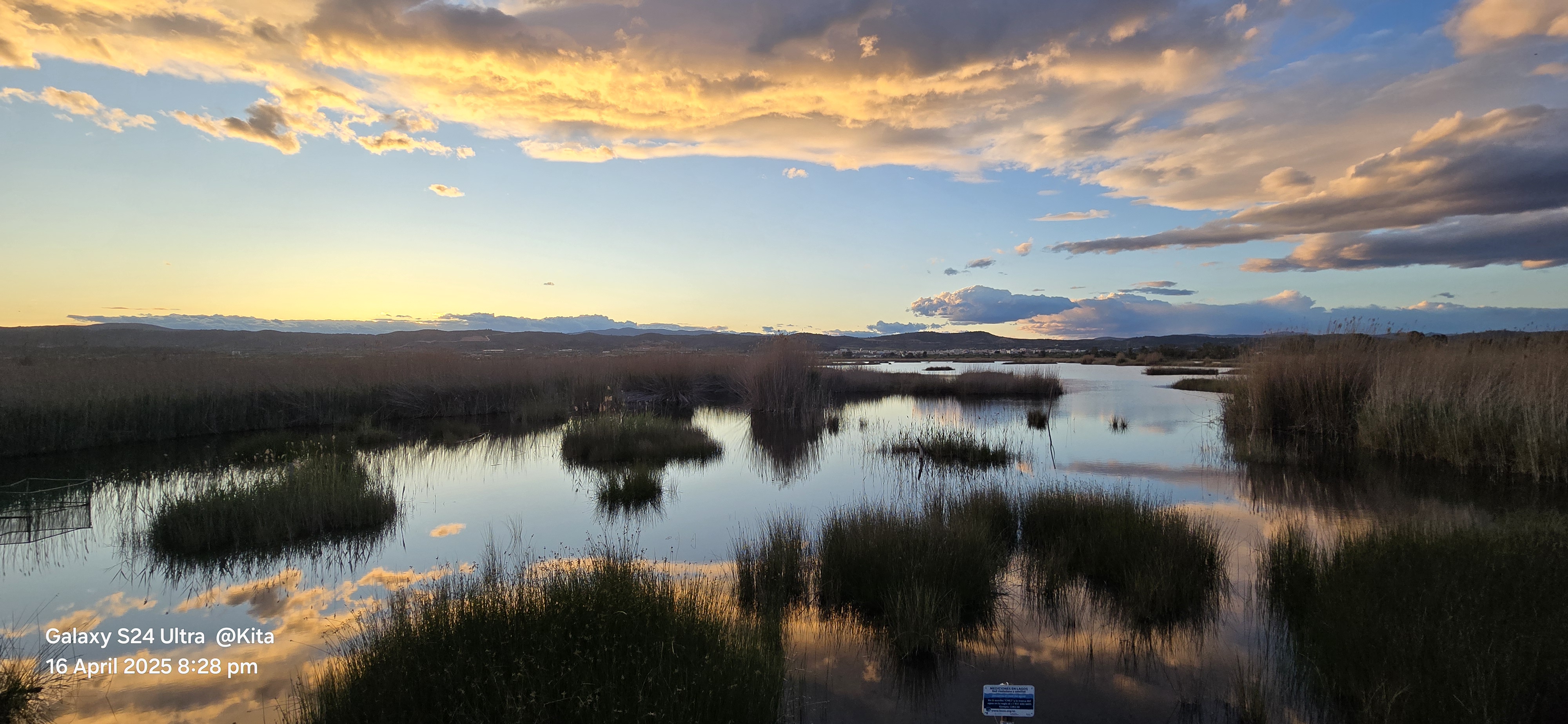 Sunset reflections across coastal wetlands
